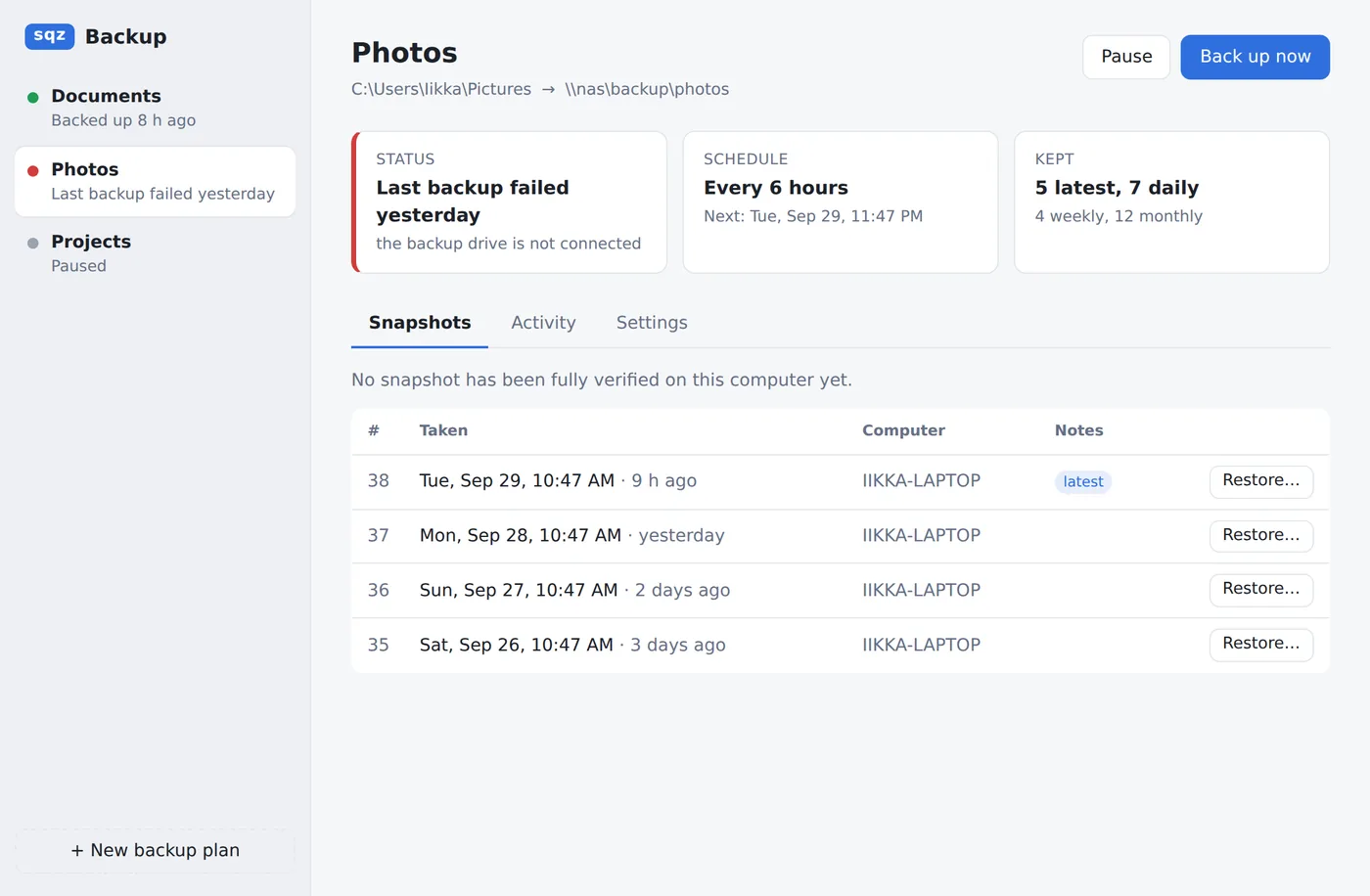 The Photos plan after a failed backup, with the reason shown at the top.