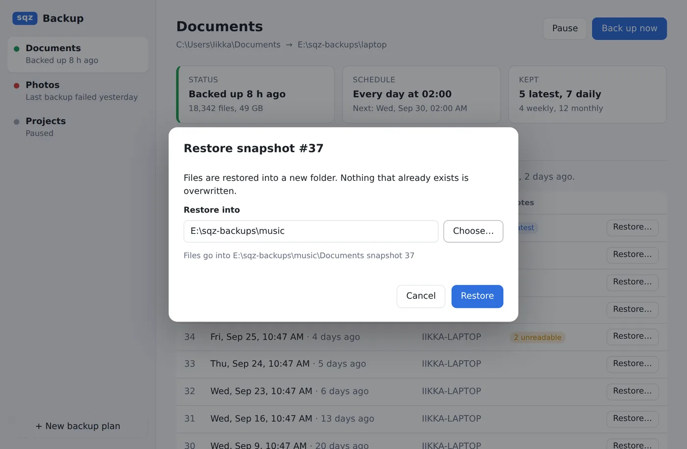 The restore dialog: files are restored into a new folder and nothing is overwritten.